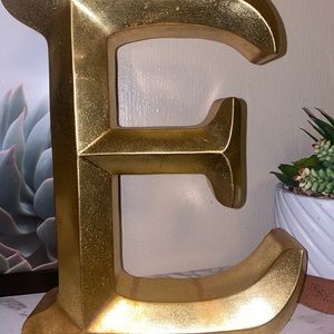 Thick gold letter E- SOLD